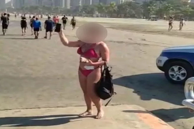 Mulher se recusa a usar máscara na praia e ofende Guarda municipal - News Rondônia