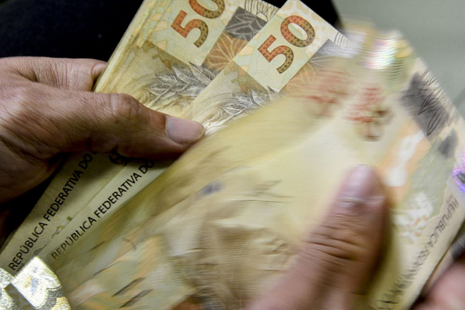 Sancionada lei que libera consignado para o Auxílio Brasil - News Rondônia
